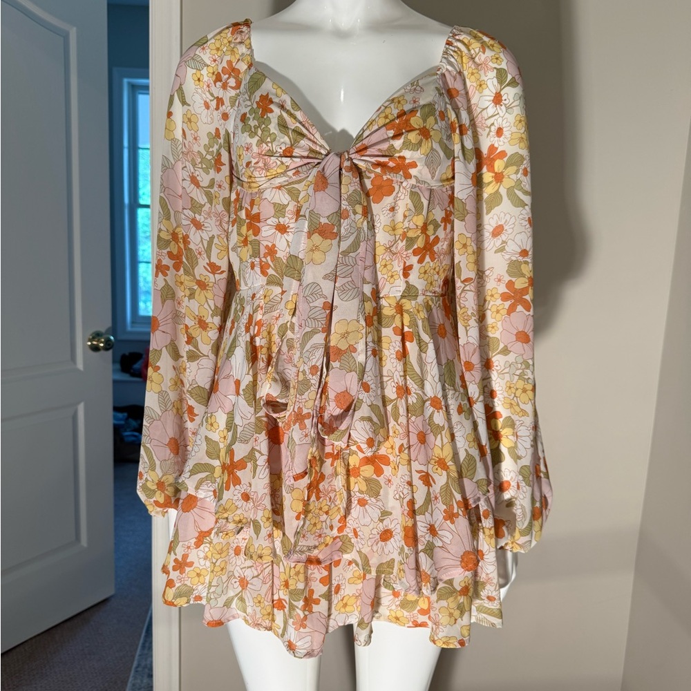 Fashion Nova Cream and Yellow Floral Romper